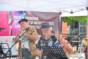 Musicians playing at sound of music