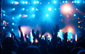 Crowd cheering at a concert